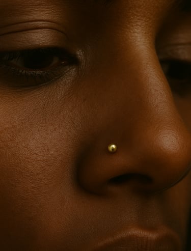a woman with a nose piercings and nose piercings