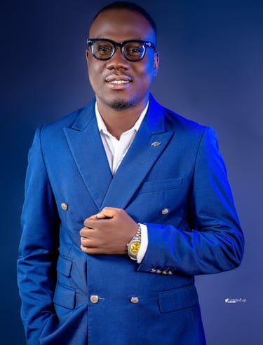 a man in a blue suit and glasses