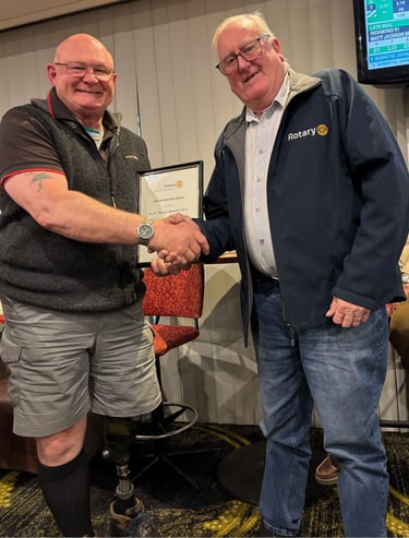 President Keith congratulates Wayne Brown for 25 years of service