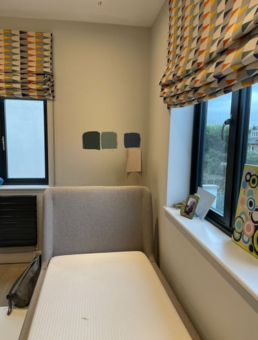 Colours swatches painted on wall to see how they look in different light conditions