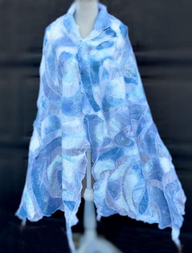 Handmade blue and white nuno felted wool scarf with a marble swirl pattern 