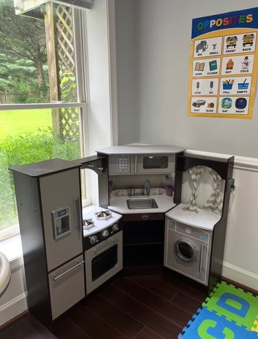Toy kitchen for children to play with at the daycare