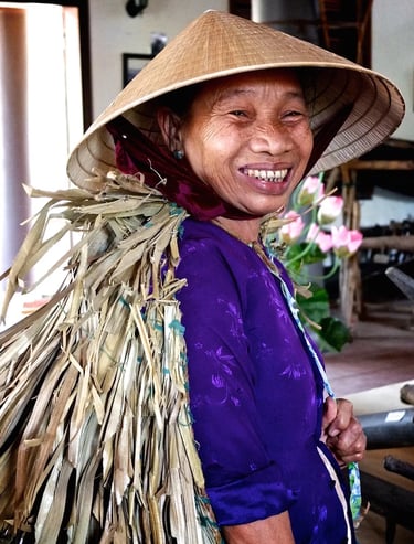 a woman in a hat with a straw hat