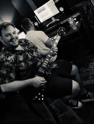 black and white image of john smiling