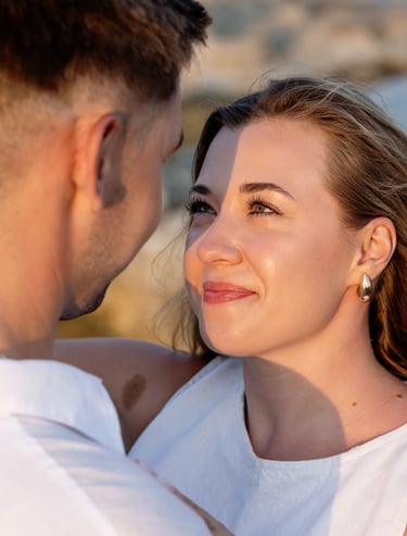 couples photoshoot with natural golden light, close up, at Qawra seaside, Malta