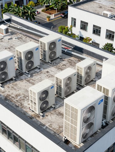 Close-up of a modern thermostat displaying temperature settings in a stylish home interior.
