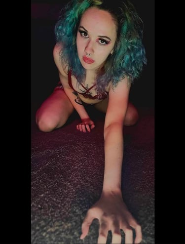 a woman with blue hair and a blue wig