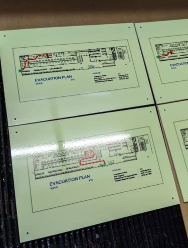 Green acrylic Evacuation Plan 4 piece showing floor plans