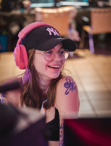 a woman with a baseball cap and headphones