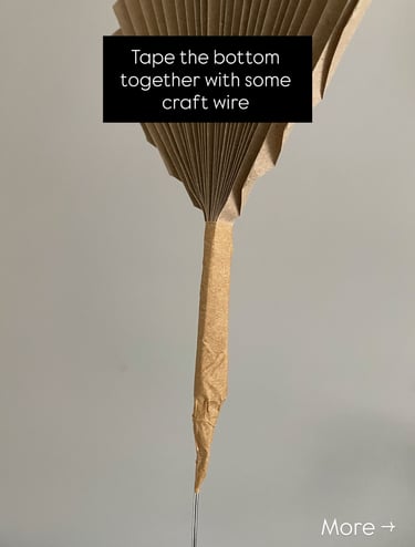 accordion-style folded flower petal for DIY lamp shade, taped with brown paper tape and wire