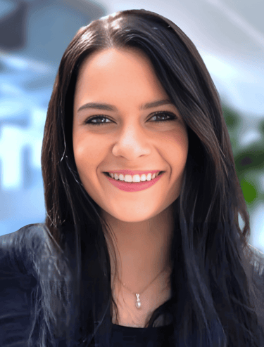 a woman with long hair and a black top
