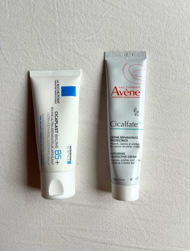 La Roche-Posay Cicaplast Balm B5 and Avène Cicalfate+ repair creams on white background 