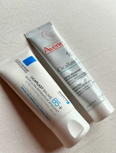 La Roche-Posay Cicaplast Balm B5 and Avène Cicalfate+ repair creams on white background