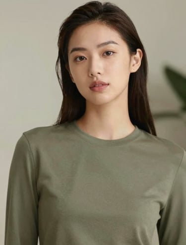 A portrait of a beauty professional looking confident and artistic, wearing a minimal outfit in olive green #6B705C, soft focus background, premium magazine style composition.
