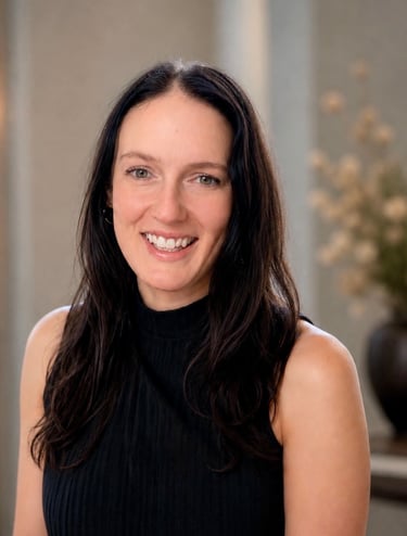 Headshot of Jenn Satre with soft background, in Minneapolis, MN