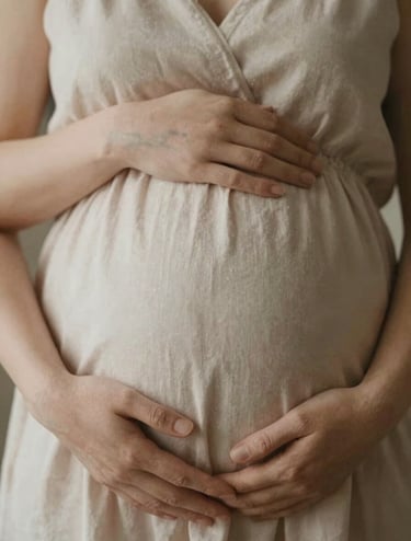 An intimate close-up shot of two sets of hands resting on a pregnant belly. The lighting is soft and natural, emphasizing the texture of the skin and the soft fabric of a dress. Warm, inviting atmosphere with cinematic depth of field.
