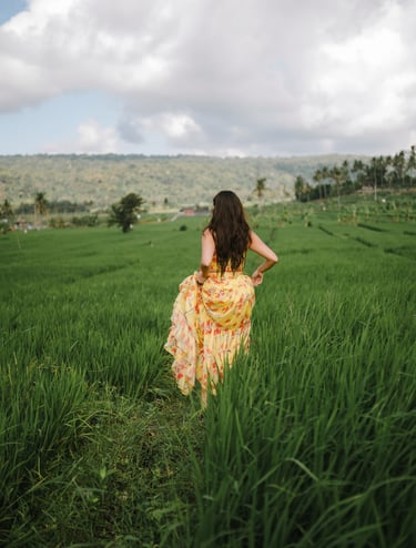 Lifestyle portrait in green ricefield landscape Karangasem Bali