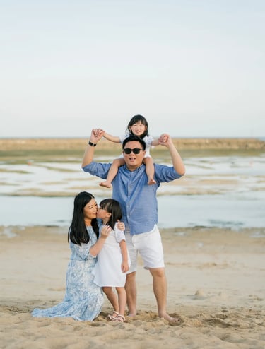 Lifestyle family photography on the beach at The Apurva Kempinski Bali