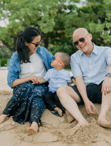 Family portrait captured at sunset during a natural family photography session at Nusa Dua Beach Bali