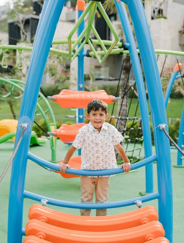 Child portrait at the family playground of The Apurva Kempinski Bali in Nusa Dua