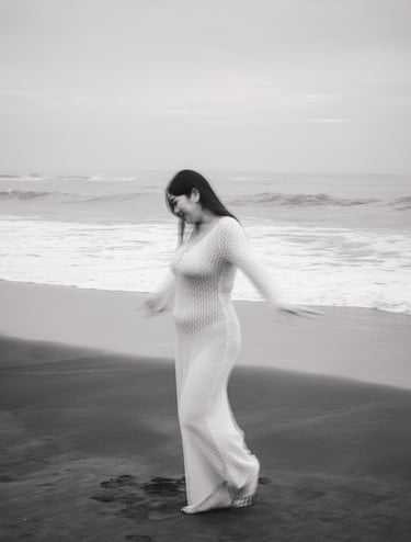 candid couple photography on black sand beach in Bali  ⸻