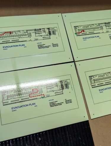 Green acrylic Evacuation Plan 4 piece showing floor plans