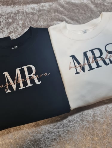 matching mr and mrs have been embroidered on these windcheaters sweatshirts