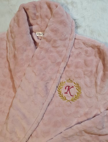 This is a dressing gown that has been personalised for my customer with a wreath, crown and initial