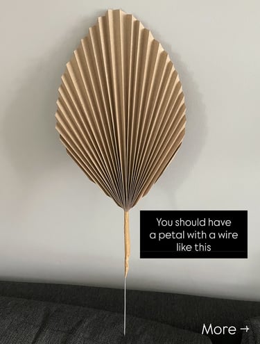 accordion-style folded flower petal for DIY lamp shade, taped with brown paper tape and wire