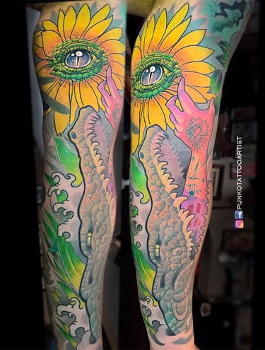 tatuaje cocodrilo, ojo, mano, girasol neotradicional