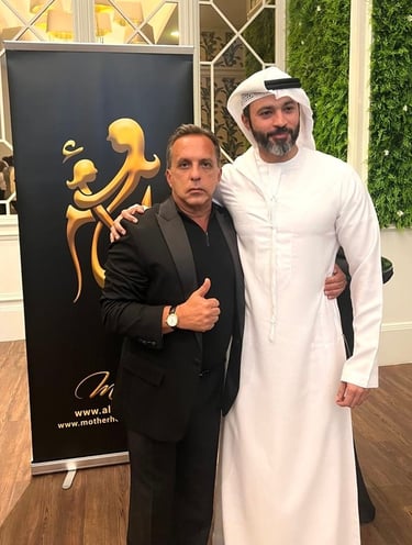Bedig Minassian and a Sheikh, both in suits, pose together at an event