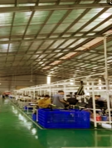 Overview of a King Fly partner factory's organized bag manufacturing production line.