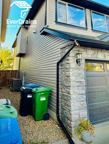 Seamless aluminum gutters installed for home water drainage protection