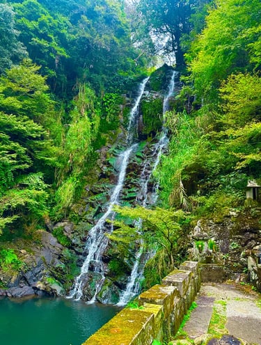 Taki no Kannon statue beside a small waterfall in Nagasaki