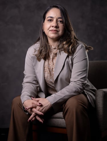 a woman in a suit and a suit jacket