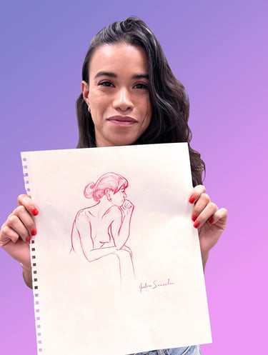 Portrait of me with side hair, holding a drawing of a woman's side profile in red color pencil.