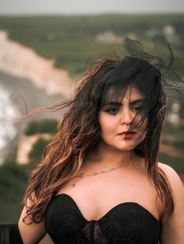 Woman in black dress posing outdoors – creative portrait photography in Kent by Fred Art Studio