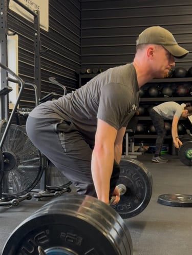 a man with a barbell