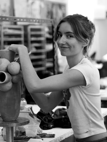 Irene de Vilder with one of her vases.
