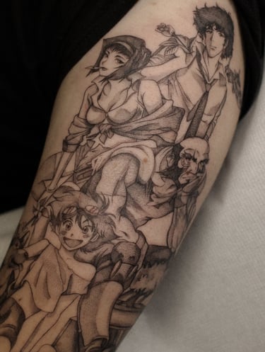 tatouage Cowboy Bebop sur le haut du bras, exécuté par Margot Dubs Tattoo