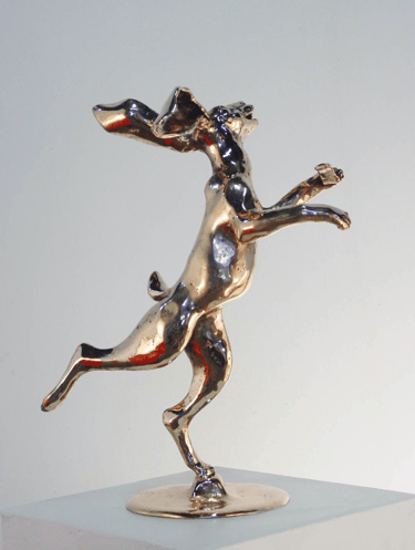 a  bronze statue of a rabbit holding a lottery ticket