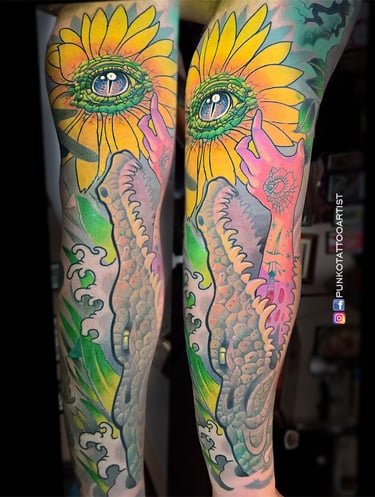 tatuaje cocodrilo, ojo, mano, girasol neotradicional