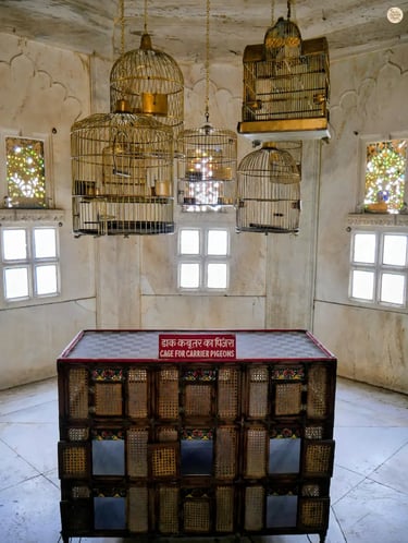 Traditional pigeon cages once used for carrying royal mail in Udaipur Rajasthan.