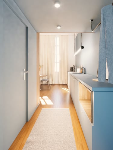 hall d'entrée peint en bleu pastel, continuité avec la cuisine linéaire