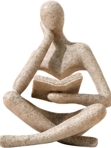 Modern sandstone thinker statue of a person reading a book, ideal for minimalist home office decor.