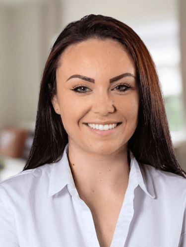 a woman with a smile on her face