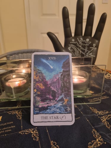 the star tarot card, ornamental hand, candles