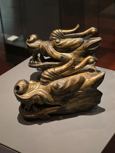 Bronze dragon head statues