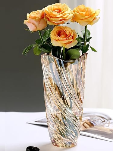 Crystal figurine with gold rose detailing, decorative luxury ornament for gifting and display.