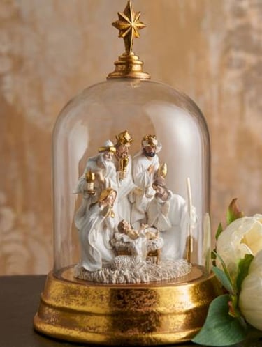 Nativity displayed under cloche